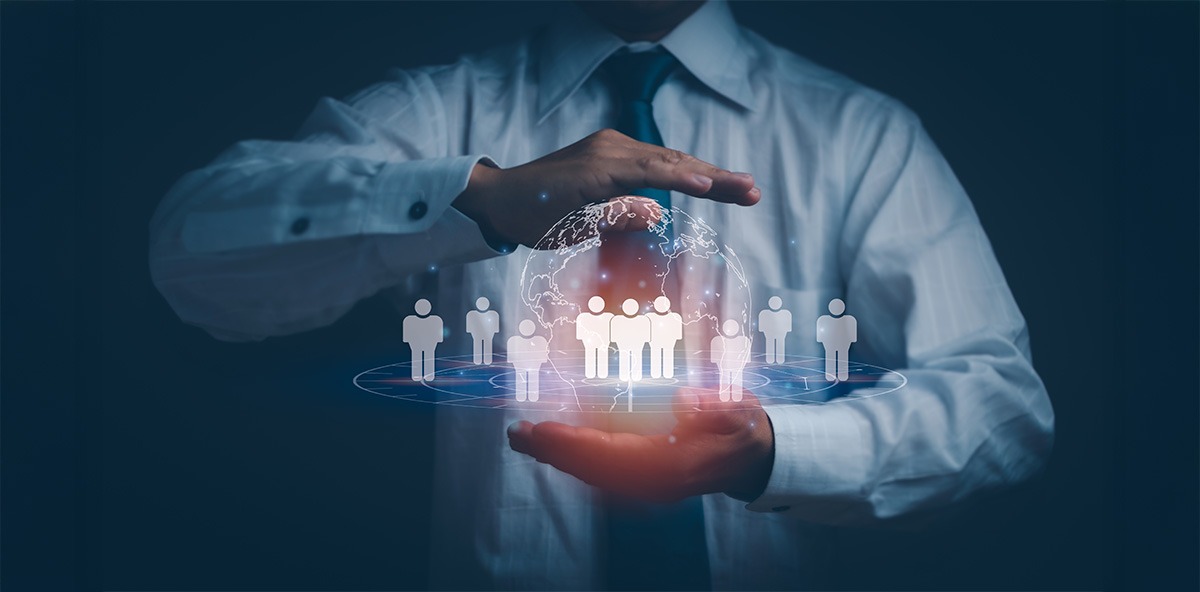 Businessperson holding a digital globe surrounded by virtual team icons, symbolizing global PartnerOps evolution and ecosystem growth.