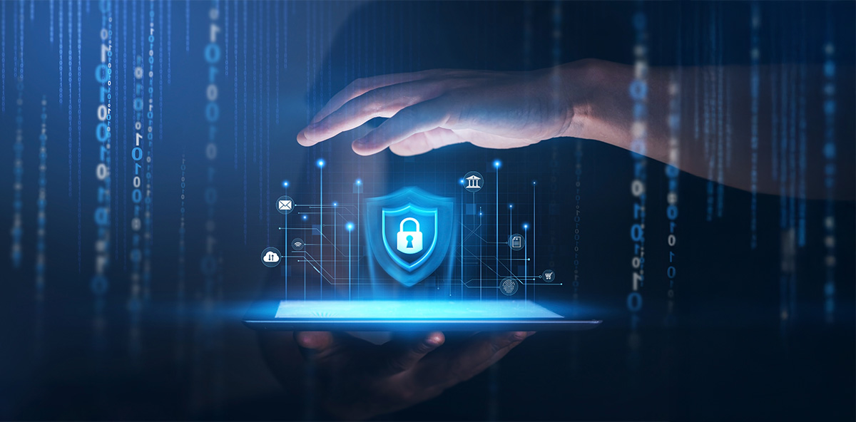 Hand hovering over a digital shield icon on a tablet, symbolizing data security and how a partner ecosystem enables scalable zero trust protection across digital platforms.